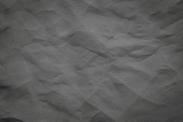zmačkaný OK syntetické textilie černé barvy - Fotografie, Obrázek