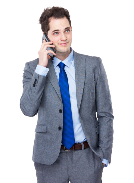Businessman talking on cellphone - Fotografie, Obrázek