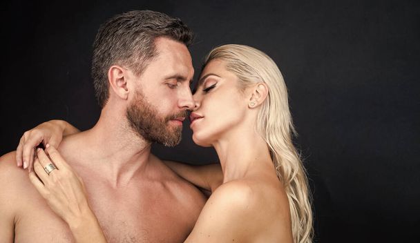kissing. sensual woman embrace naked man. girlfriend and boyfriend play erotic games. romantic love relationship. kissing tender lovers. copy space. sexy couple in love. passion and desire. - 写真・画像