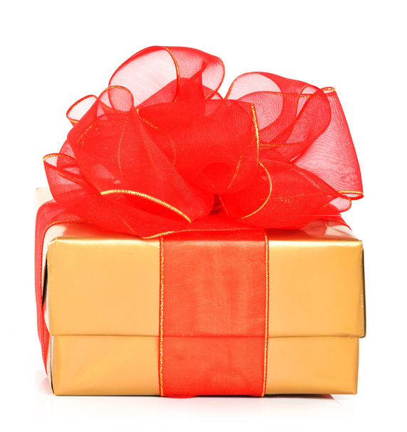Golden gift boxes with a red bow - Fotó, kép