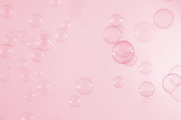 Abstract Beautiful Transparent Pink Soap Bubbles Background. Soap Sud Bubbles Water. - Foto, afbeelding