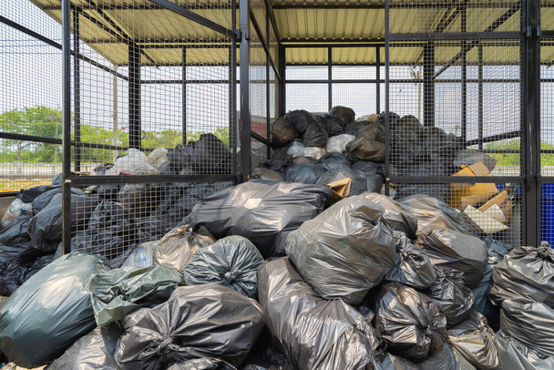 Background Garbage Dump Green Garbage Bags, Bin,Trash, Garbage, Rubbish,  Plastic Bags Pile Stock Photo, Picture and Royalty Free Image. Image  97615192.