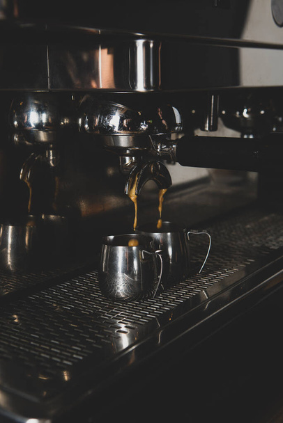 Coffee making machine and pouring espresso cafe concept - Fotó, kép