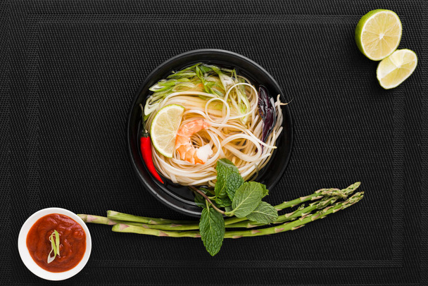 top view noodles bowl with asparagus. High resolution photo - Photo, Image
