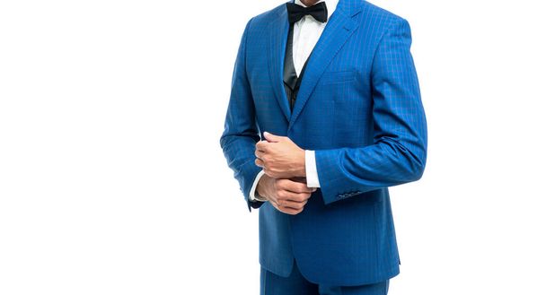 mature formal man in blue tuxedo bowtie isolated on white background. - 写真・画像