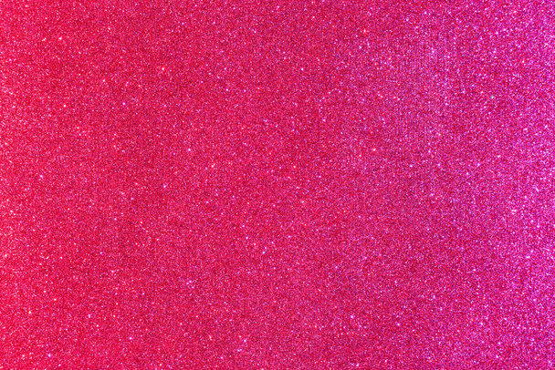 キラキラの背景。キラキラした背景。光沢のある質感の表面。ピンク色が強い。混合ネオンライト - 写真・画像