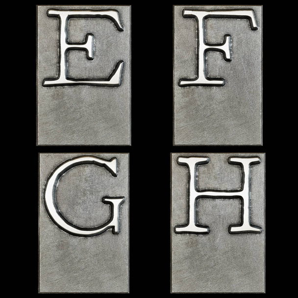 Representación 3D del alfabeto de la cabeza de impresión de la máquina de escribir de metal - letras E-H - Foto, imagen