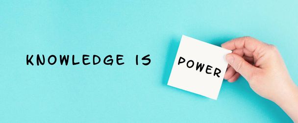 The phrase knowledge is power is standing on a paper, coaching and education concept, development of personal potential, cognition and willpower - Foto, Imagem