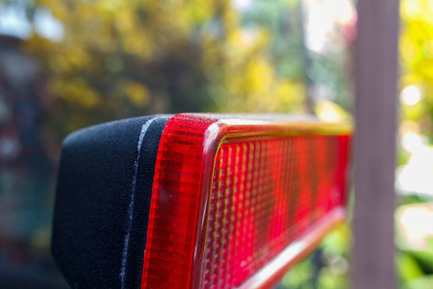 A closeup shot of a red break light on a car - Foto, Bild
