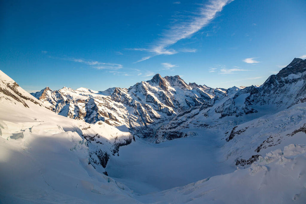 An aerial view of beautiful mountains during winter - Φωτογραφία, εικόνα