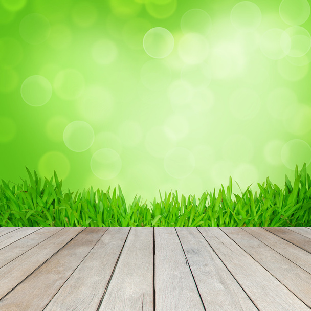 houten planken vloer met groene achtergrond - Foto, afbeelding
