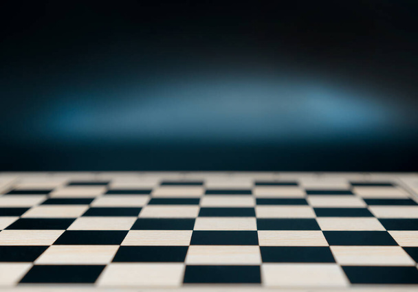 Chessboard on abstract background.  Business plan or game for kid - 写真・画像