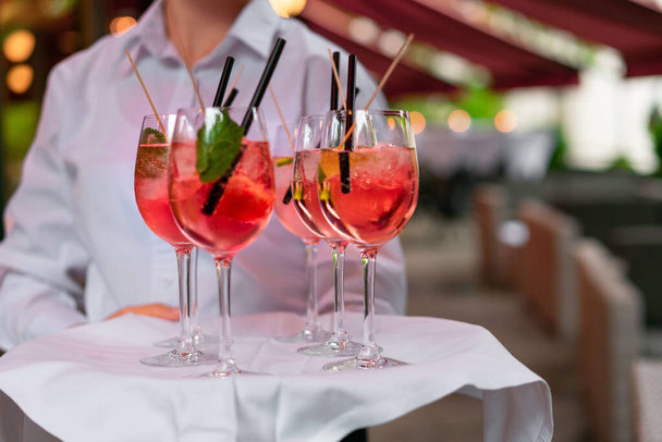 A closeup shot of multiple cocktails being served - Fotoğraf, Görsel