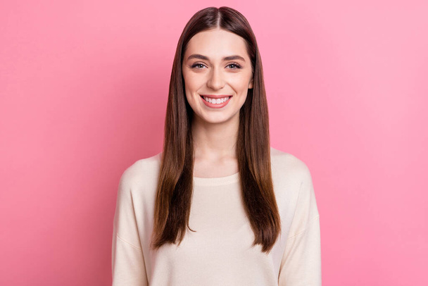 Portrait of attractive cheerful content brunet girl wearing casual sweater isolated over pink pastel color background. - Фото, изображение