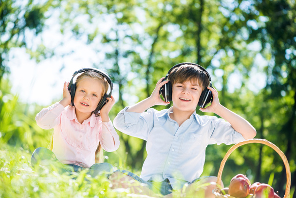 Children enjoying music - Фото, зображення