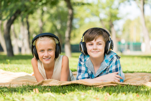Kids wearing headphones - Foto, Imagen