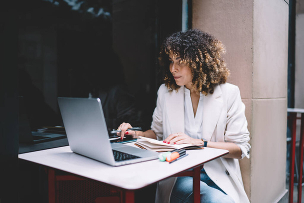Skilled female freelancer checking received email message during online e learning via laptop computer - Foto, Imagem