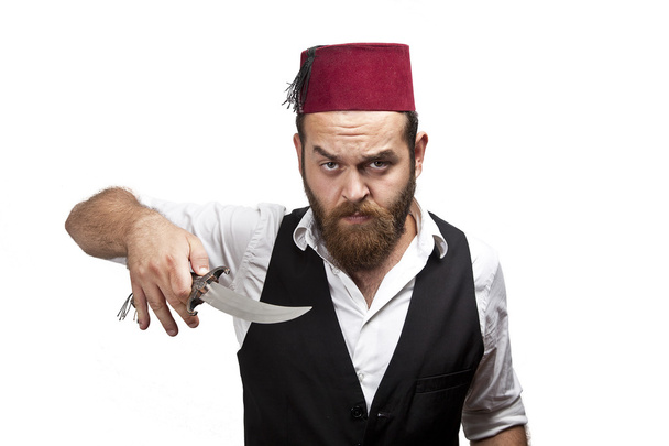 Man in traditional turkish hat and dress kabadayi with dagger - Photo, Image