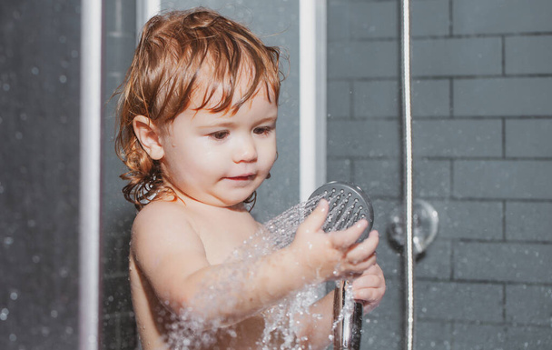 Wash infant hygiene and health care. Bathing baby. Happy kid with soap foam on head - Zdjęcie, obraz