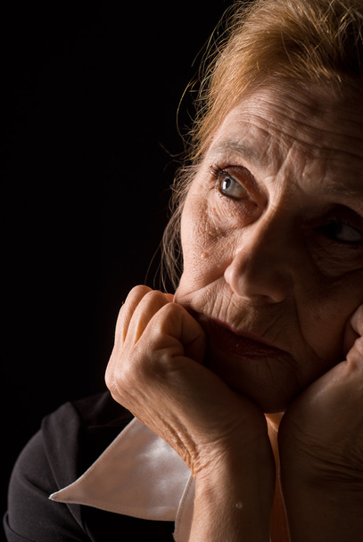 Old woman on black - Foto, Imagem