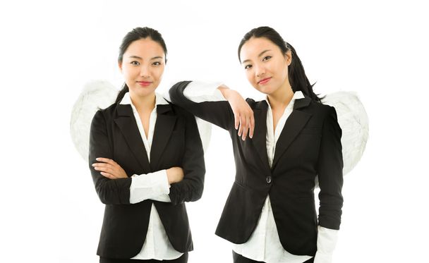Múltipla imagem representando lados de anjo de uma jovem empresária asiática isolada no fundo branco
 - Foto, Imagem