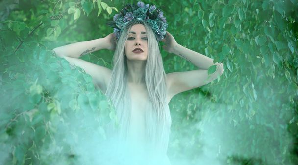 Old European magic, Mystical Pagan scene, woman in lake, rite. Magic divination in water, undina  - Fotoğraf, Görsel