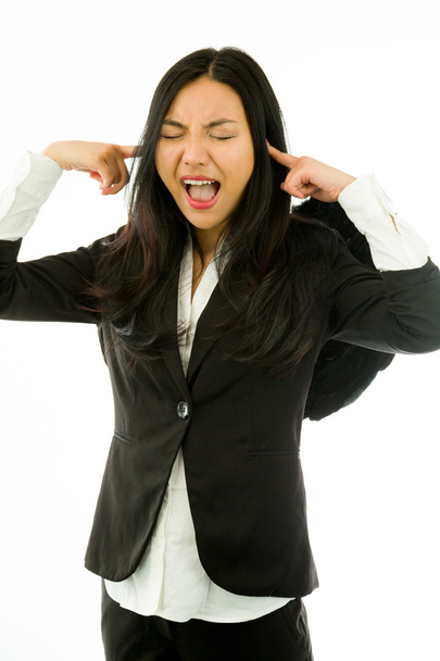 Asian young businesswoman dressed up as black angel shouting with hands in ear isolated on white background - 写真・画像