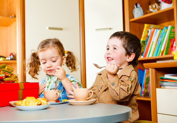 Children having tea - Фото, изображение