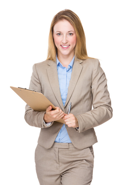 Businesswoman with clipboard - Photo, Image
