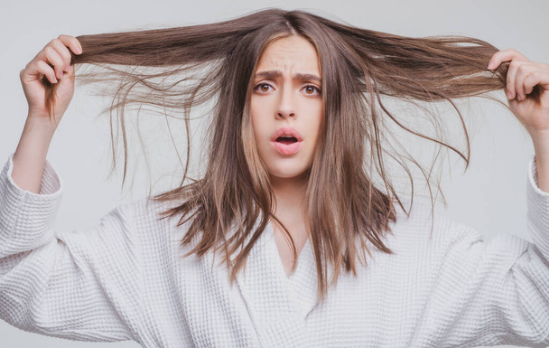 Hair for hair loss problem, woman show her hair tangled damaged hair - Foto, imagen