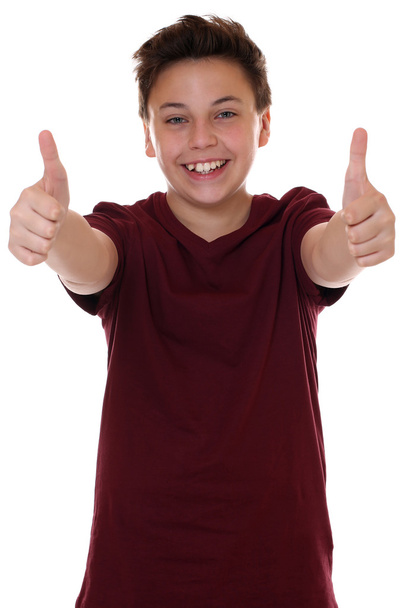 Successful young teenager boy showing thumbs up - Фото, изображение