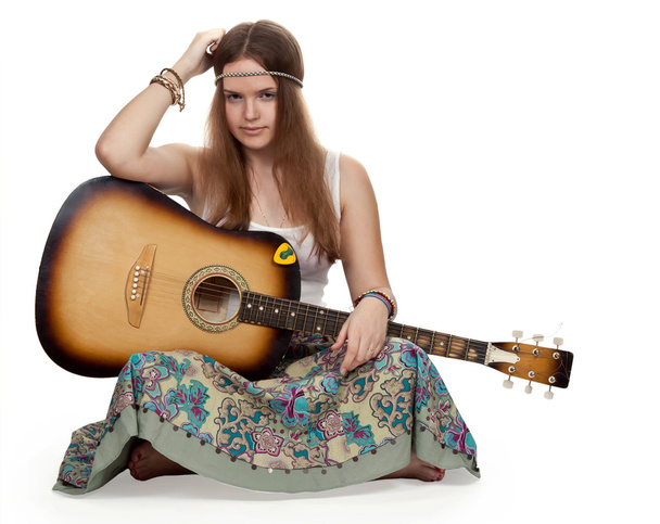 Hippie girl with a guitar - Foto, Imagen