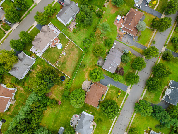 Aerial view of small american town residential houses roofs neighborhood in New Jersey USA - Photo, Image