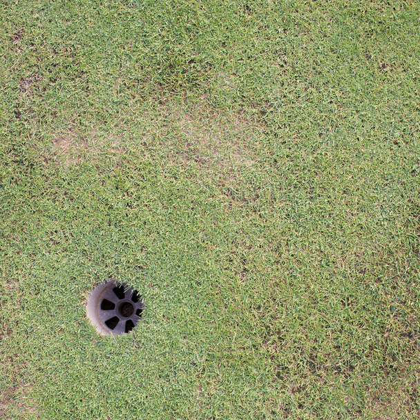 golf hole on green grass, golf course - Foto, Bild