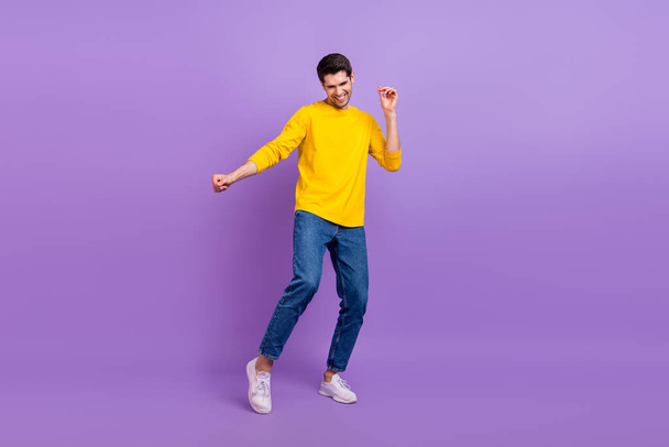 Full size photo of cheerful good mood male have fun dancing enjoy summer vacation isolated on violet color background. - Фото, изображение