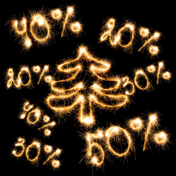 Sparkling inscripción de 50 por ciento, 40 por ciento, 30 por ciento, 20 por ciento con árbol de Navidad o
 - Foto, Imagen