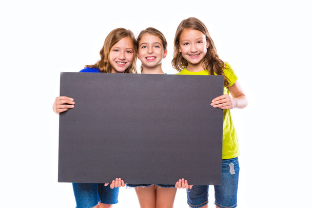 happy kid girls holding black board copyspace - Photo, Image