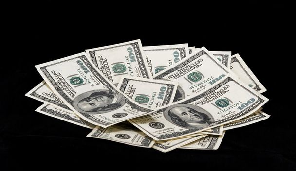 Доллары на черном фоне
 - Фото, изображение