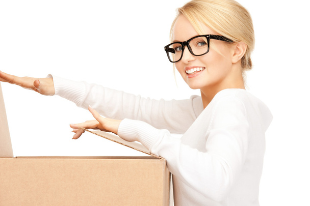 Attractive businesswoman with cardboard box - Photo, image