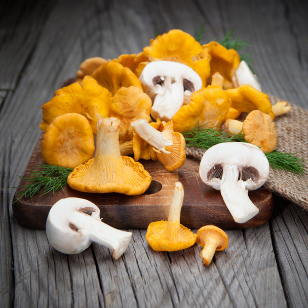 Mushrooms on a wooden table - Photo, Image