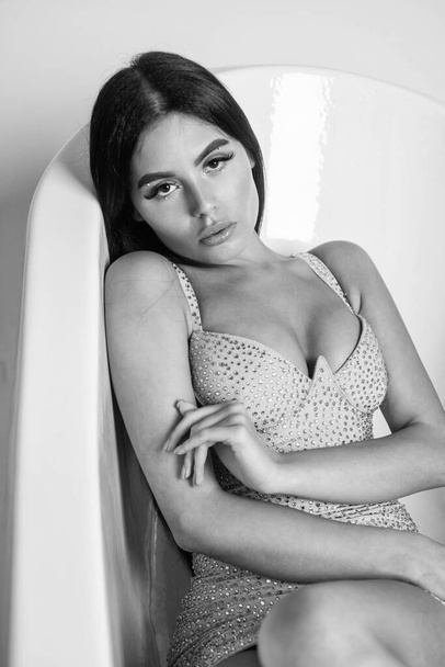 Her perfect style. woman skincare portrait. sexy woman relax in bathtub. female fashion and beauty. beautiful lady with fashionable makeup. sexual young girl in formalwear. glamour and pretty. - 写真・画像