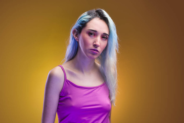 young female in neon modern colorful stylish. copy space fashion  - Φωτογραφία, εικόνα