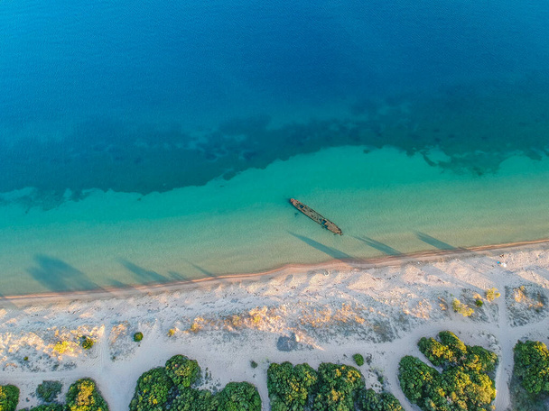 Panoramic aerial view over the shipwreck in Divari beach near Navarino bay, Gialova. It is one of the best beaches in mediterranean Europe located in Messinia, Greece - Photo, Image