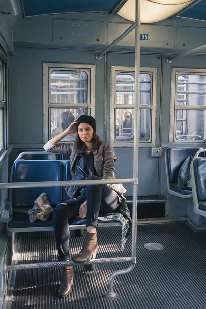Pretty girl posing in a metro car - Fotografie, Obrázek
