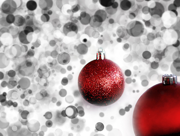 Red christmas balls in the snow bokeh - 写真・画像