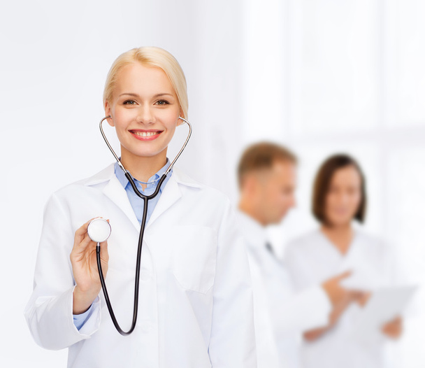 smiling female doctor with stethoscope - Fotoğraf, Görsel