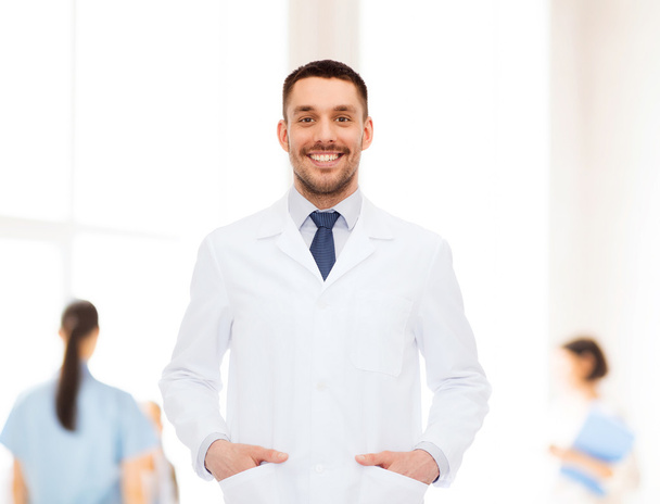 smiling male doctor in white coat - Foto, Imagem