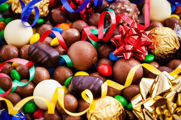 Ассорти из разных шоколадных конфет
 - Фото, изображение