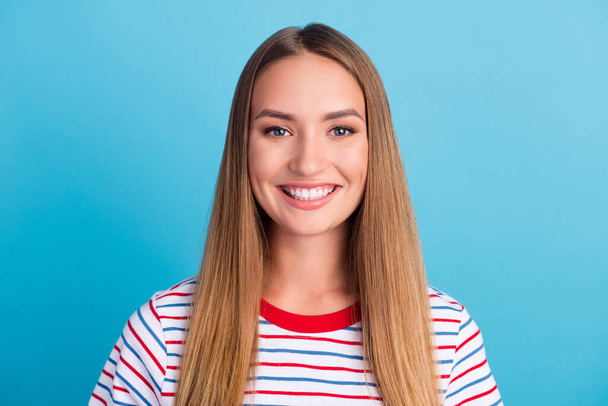 Photo of gorgeous satisfied young lady toothy beaming smile look camera isolated on bright blue color background. - Photo, Image