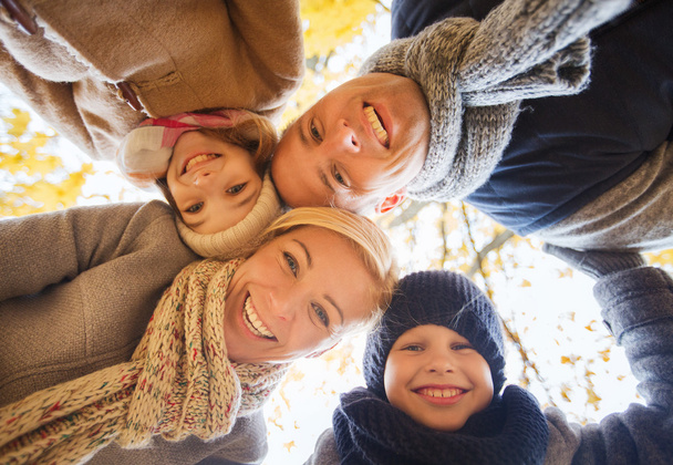 happy family in autumn park - Foto, Imagen